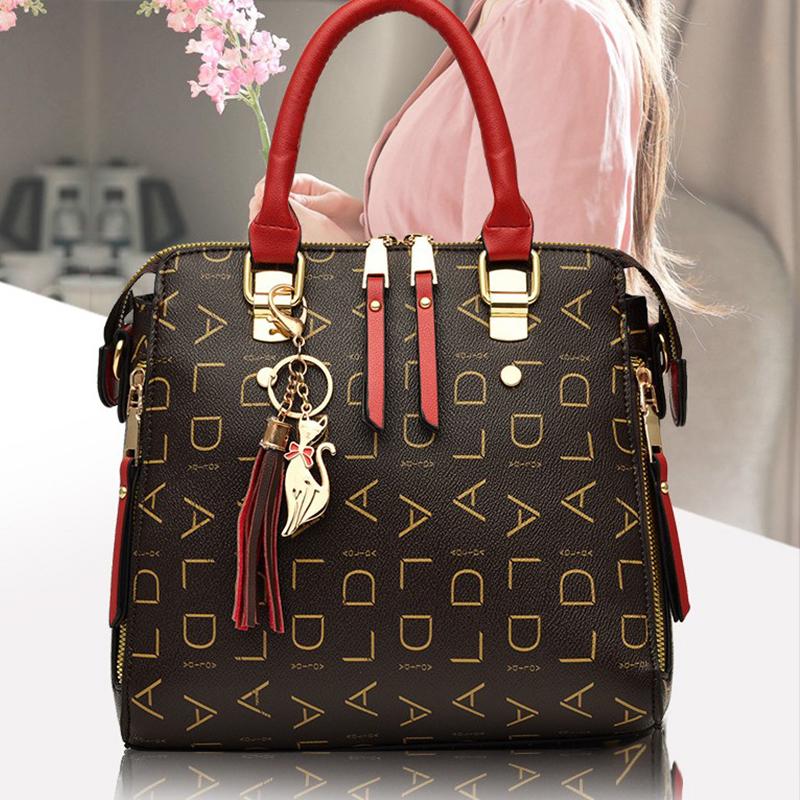 Stylish Womens Pu Leather Tote with Tassel Accent Top Handle and Shoulder Strap
