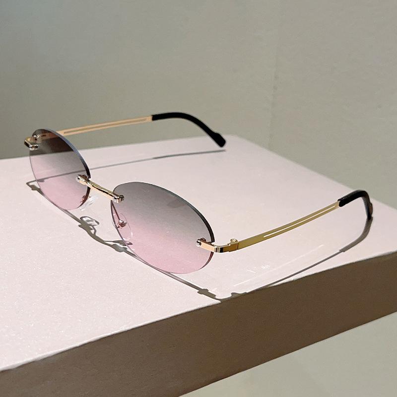 Frameless Oval Sunglasses Metal Thin Temples with Ocean-Inspired Lenses Retro Brand Designer Sunglasses UV400 Shades Eyewear