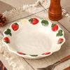Elegantes Keramikgeschirr: Reisschalen, Servierteller, Untertassen, Dessertteller mit handbemalten Blumenmotiven.