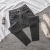 Women's High-Waisted Slimming Black Stretch Jeans – Slim-Fit, Versatile, Pencil Style, Nine-Point Length.