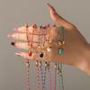 Stainless Steel Half-circle Natural Stone Acorn Pine Cone Pendant Necklace with Hand-knotted Rope Jewelry for Women.