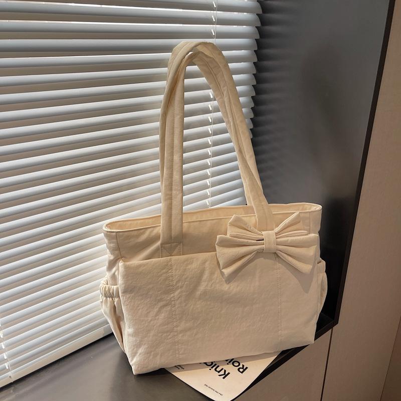 Bow tote bag for women, daily class commuting, versatile sweet girls simple and light handbag shoulder bag coffee color