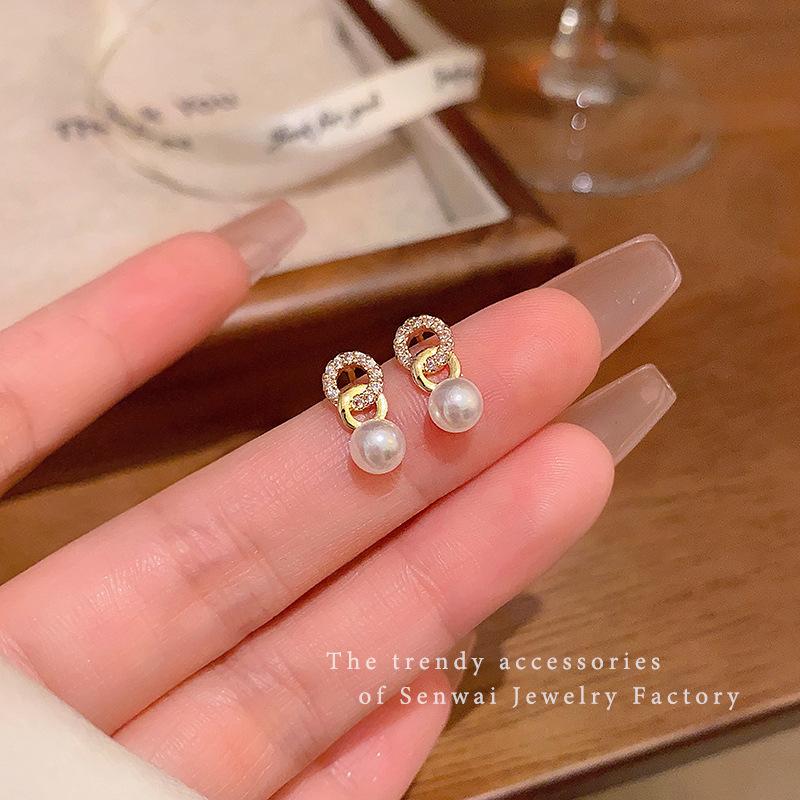 

Double ring pearl stud earrings female unique design sense Internet celebrity earrings year ear