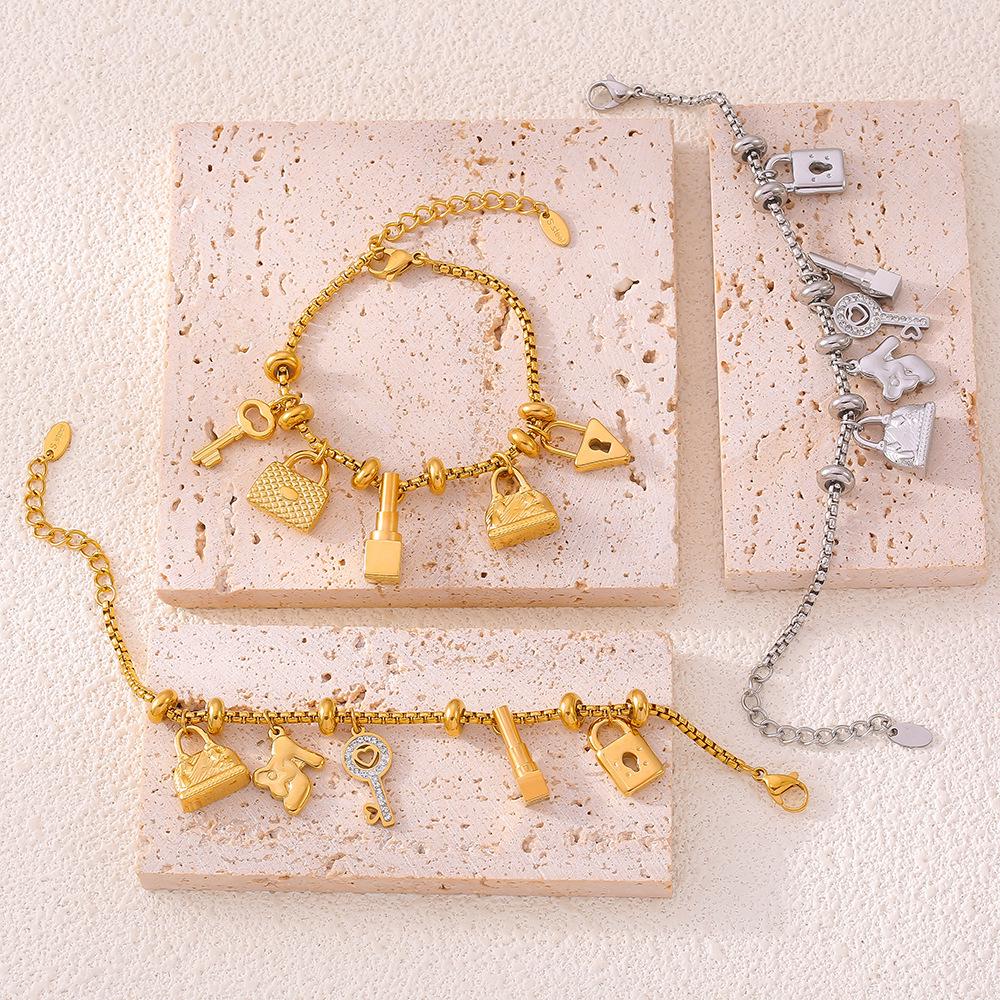 Trendy European-American Multi-Element Rhinestone Pendant Bracelet, Adjustable Retro 18K Gold-Plated Titanium Steel Jewelry