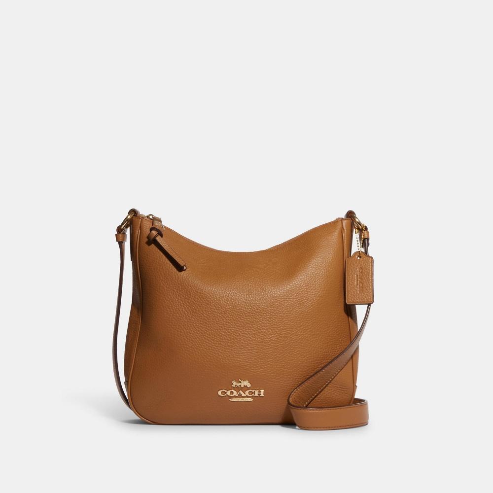 

Сумка Coach Ellie File Bag золотистого цвета, легкое седло