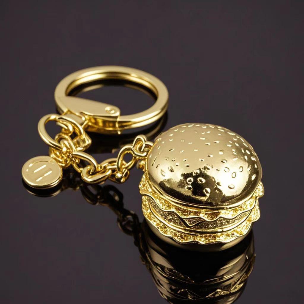 Hot Air Balloon & Hamburger Golden Keychain with Melon Seed Alloy and Sand Gold Ingot