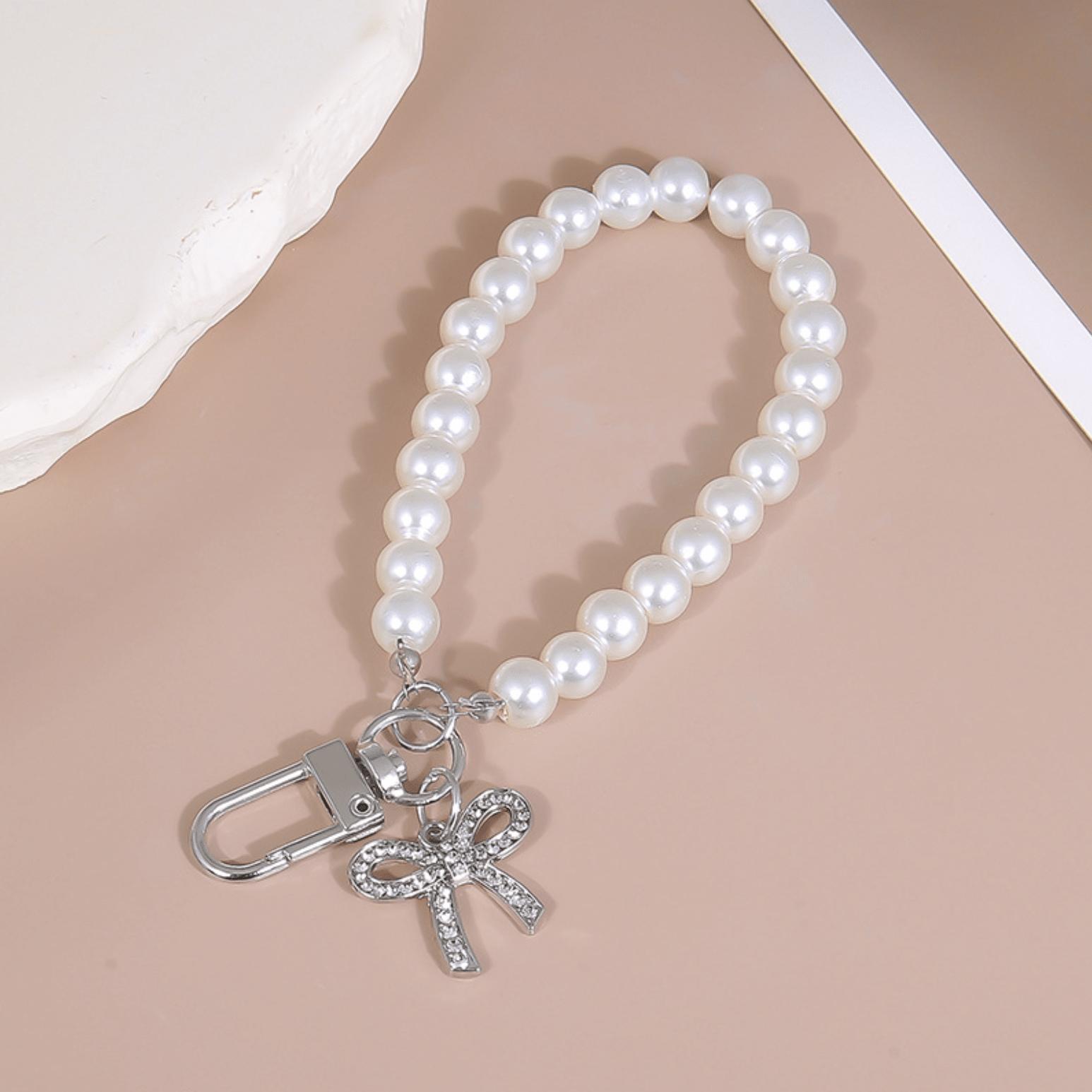 

New - Style Phone Case Ornament Bow Diamond - Inlaid Hanging Chain Glass Faux Pearl Handheld Bead Chain Short Strap Bag Pendant серебряный