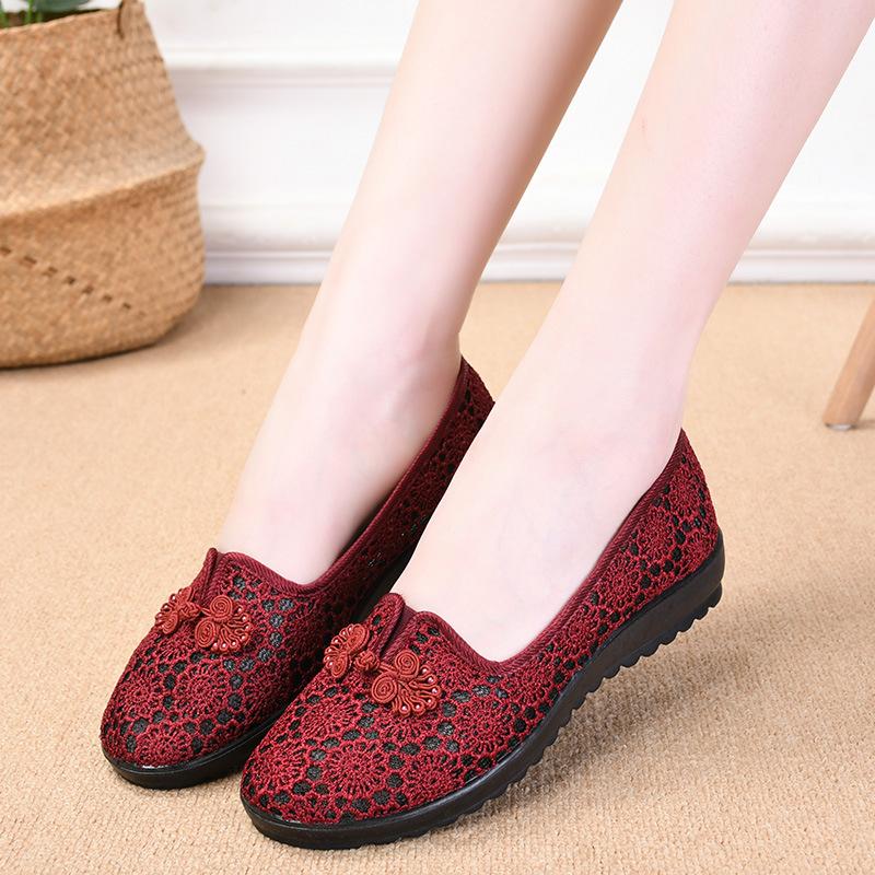 Summer new cloth shoes women's flying woven hollow breathable medium and old soft sole one pedal casual shoes