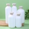 Refillable Plastic Travel Bottles – Squeeze and Pump Containers with Flip Cap for Shampoo, Lotion, Cream, and Shower Gel