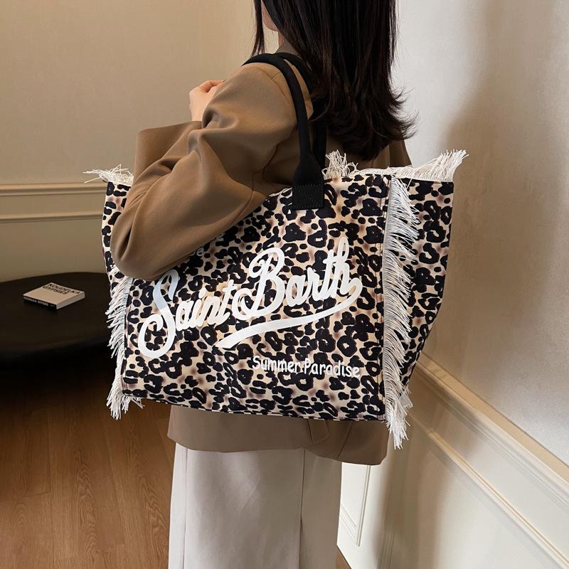New women's large-capacity leisure travel leopard print canvas handmade fringed handbag tote bag