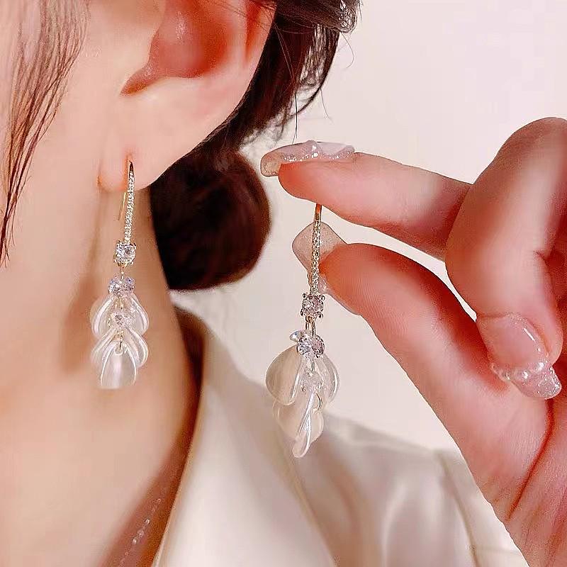 Korean Micro-Set Zircon Shell Tassel Earrings: Elegant and Trendy Niche Ear Hooks for Women. Electroplated