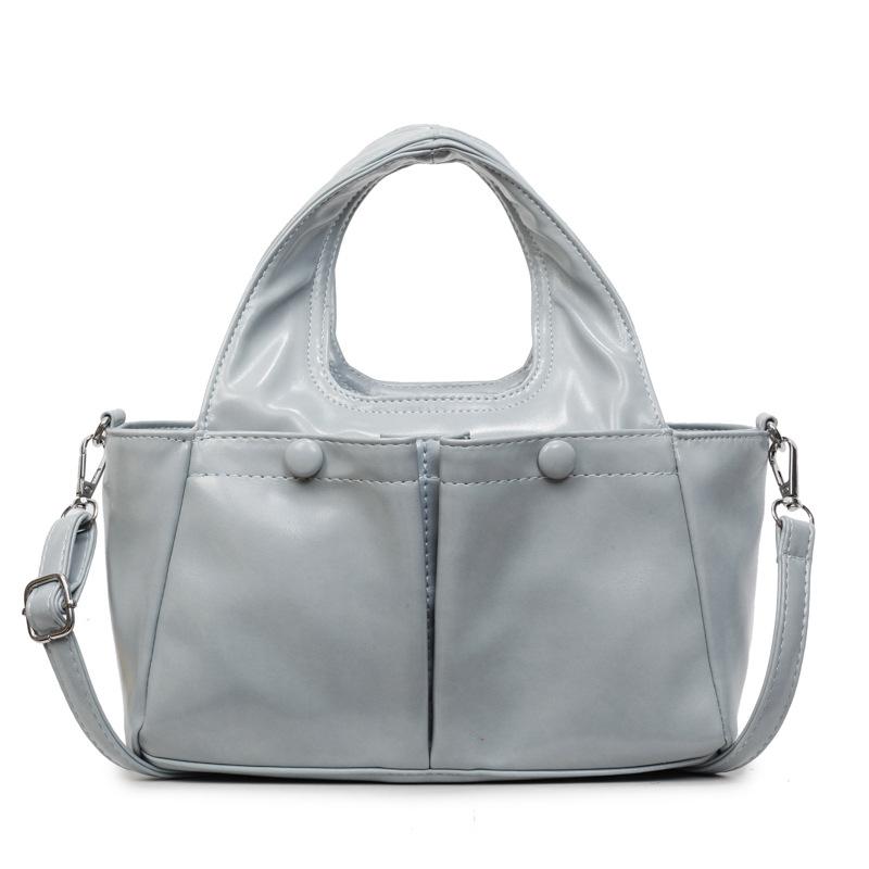 

Niche new fashionable versatile wrinkle handbag large capacity oil wax leather double pocket shoulder messenger bag