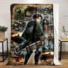A Character with Gear Faces Dynamic Battle Scenes and Towering Titans. for All Seasons Blanket Lunch Break Throw Gift