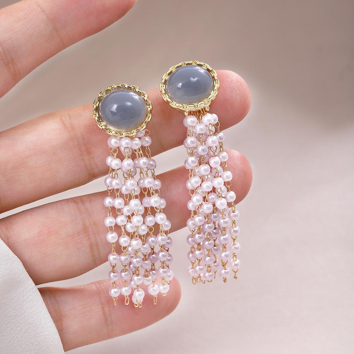 

Elegant Geometric Pearl Earrings: Silver Needle Tassel Oval for Women
