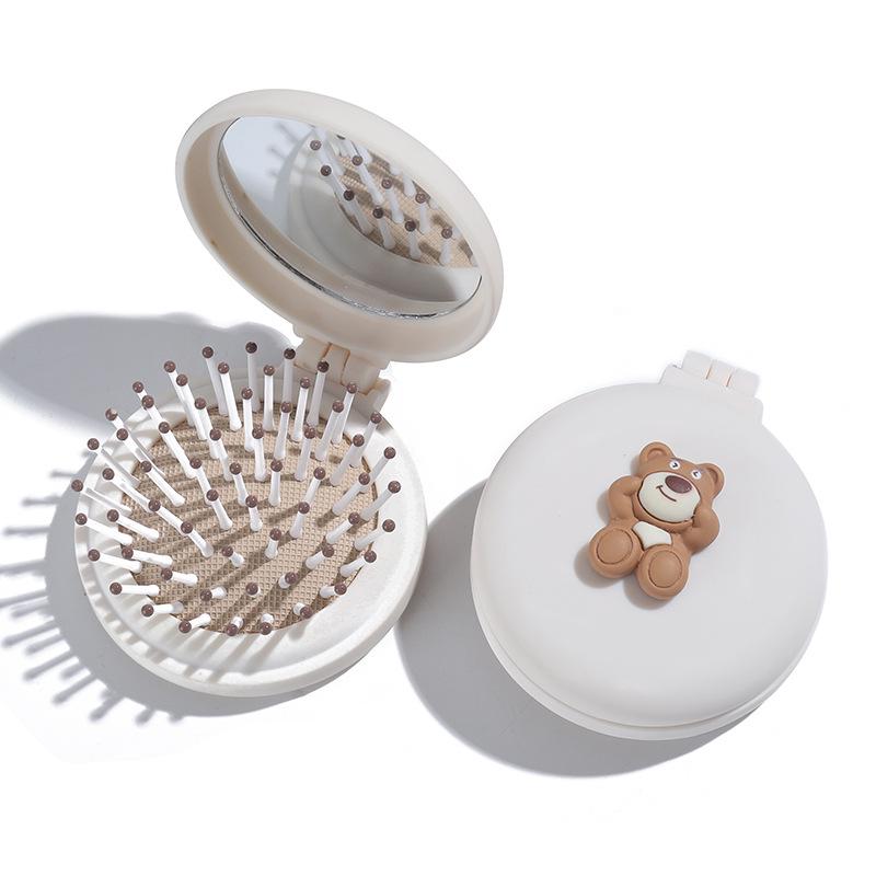 

Компактная мини-складная расческа с воздушной подушкой и зеркалом для детей - Массаж и портативный дизайн 6.5*6.5*2cm 60g