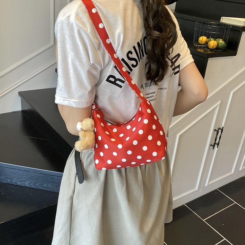 Niche polka dot pillow cloth bag women's new versatile shoulder underarm bag work small bag