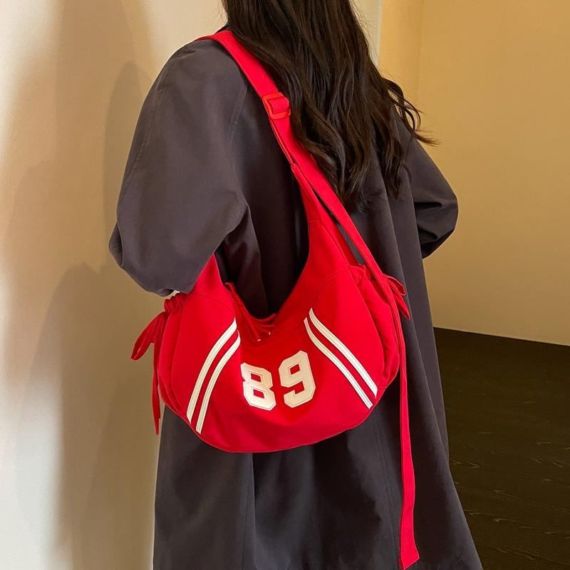 Fashionable and Unique Striped Bag for Holding Dumplings, A Casual Crossbody Bag with An Angle-hung Design At The Armpit.