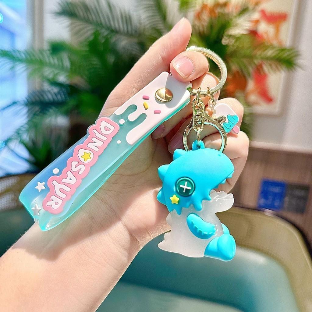 

Очаровательный брелок в виде динозавра из кремового мороженого из розового силикона, милый мультяшный аксессуар для сумки синий