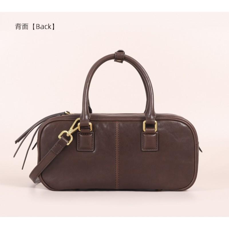 New Vegetable Tanned Leather Pillow Bag Women's Retro Niche Handbag Fashionable High-end Commuter Portable Boston