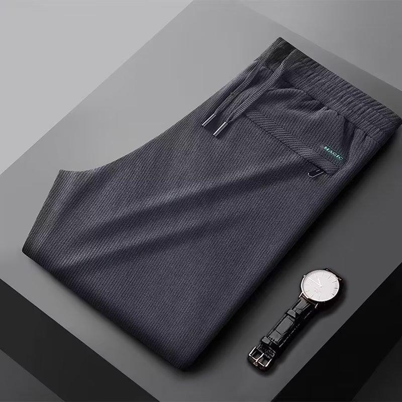 Pánské ležérní tepláky fleecové zateplené teplé jednobarevné podzimní a zimní rovné volné dlouhé tepláky