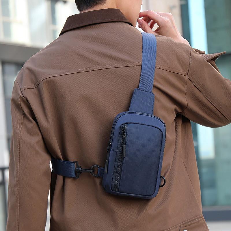 New casual men's breast bag versatile simple outdoor sports messenger bag niche casual mobile phone change shoulder bag
