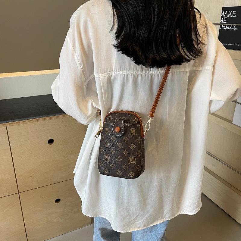 Retro shell bag presbyopia bag women's 2025 new fashion niche mobile phone bag lightweight mini shoulder bag