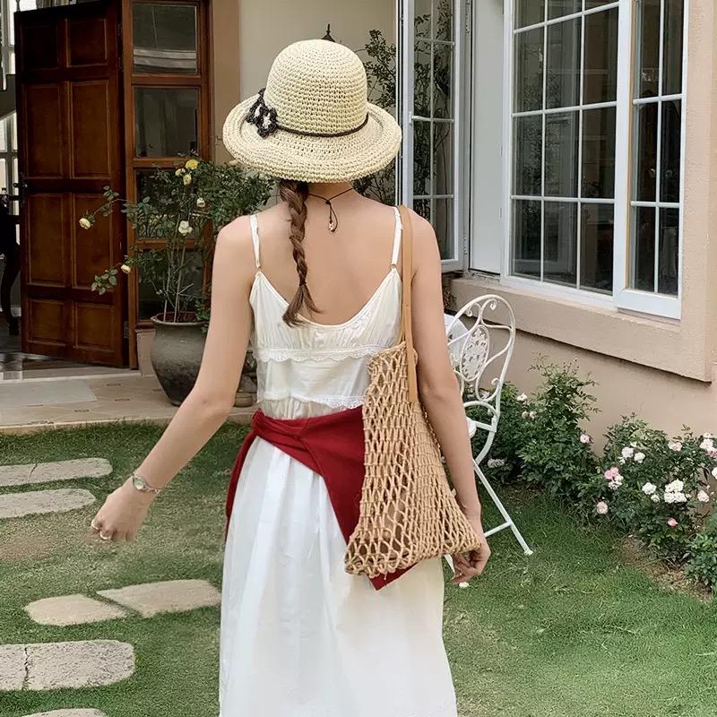 2025 new flower hand-hooked rolled-up foldable straw hat women's Korean style, versatile, small fresh breathable sunshade fisher
