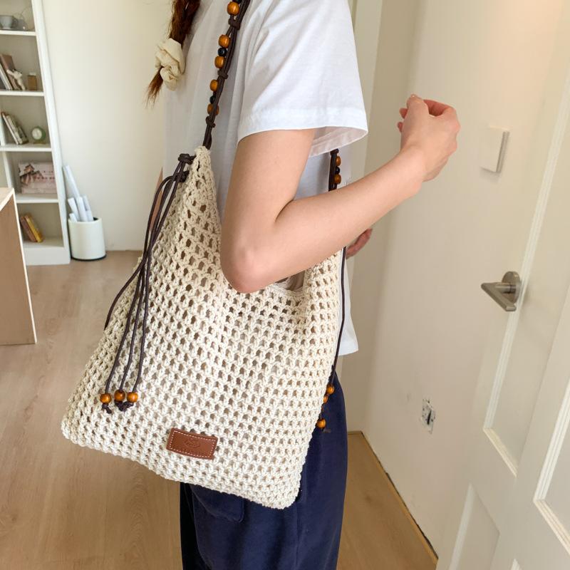 Holiday Beach Bag Women 2025 New Hollow Woven Handbag Large Capacity Versatile Messenger Bag