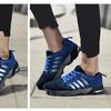 Nové sportovní boty Létající pletená síťovina Pánské běžecké boty Venkovní prodyšné Neformální Trendové pánské boty