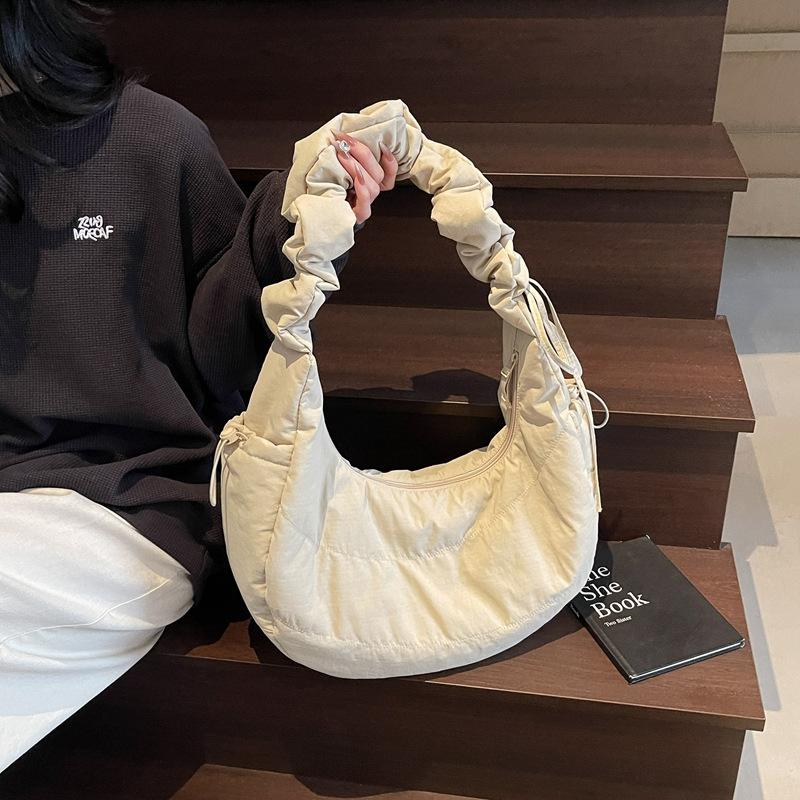 New simple shoulder bag large capacity drawstring pleated dumpling bag Japanese literary and artistic versatile portable messenger bag