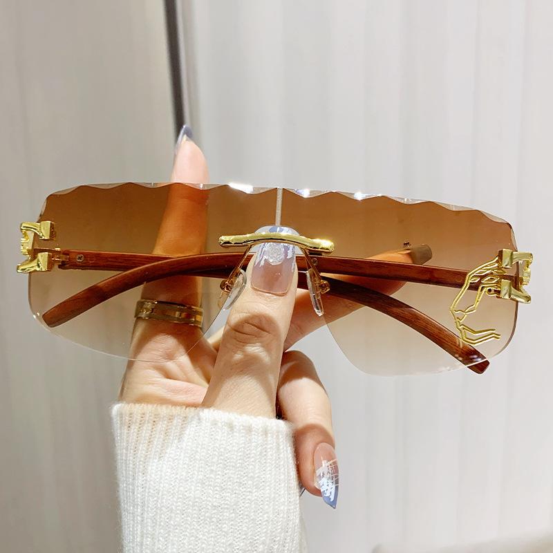 Frameless One-piece Lens Wavy Edge Ladies Personality Irregular Sunglasses