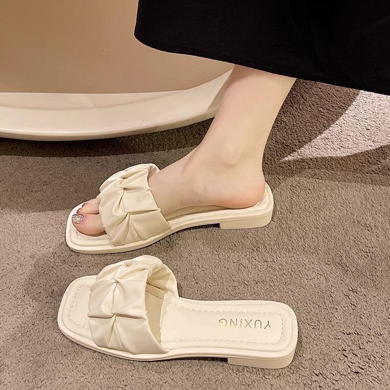 Factory direct sales French flat-bottomed cool slippers women's summer fashion 2025 new models with skirts high-end beach slippers
