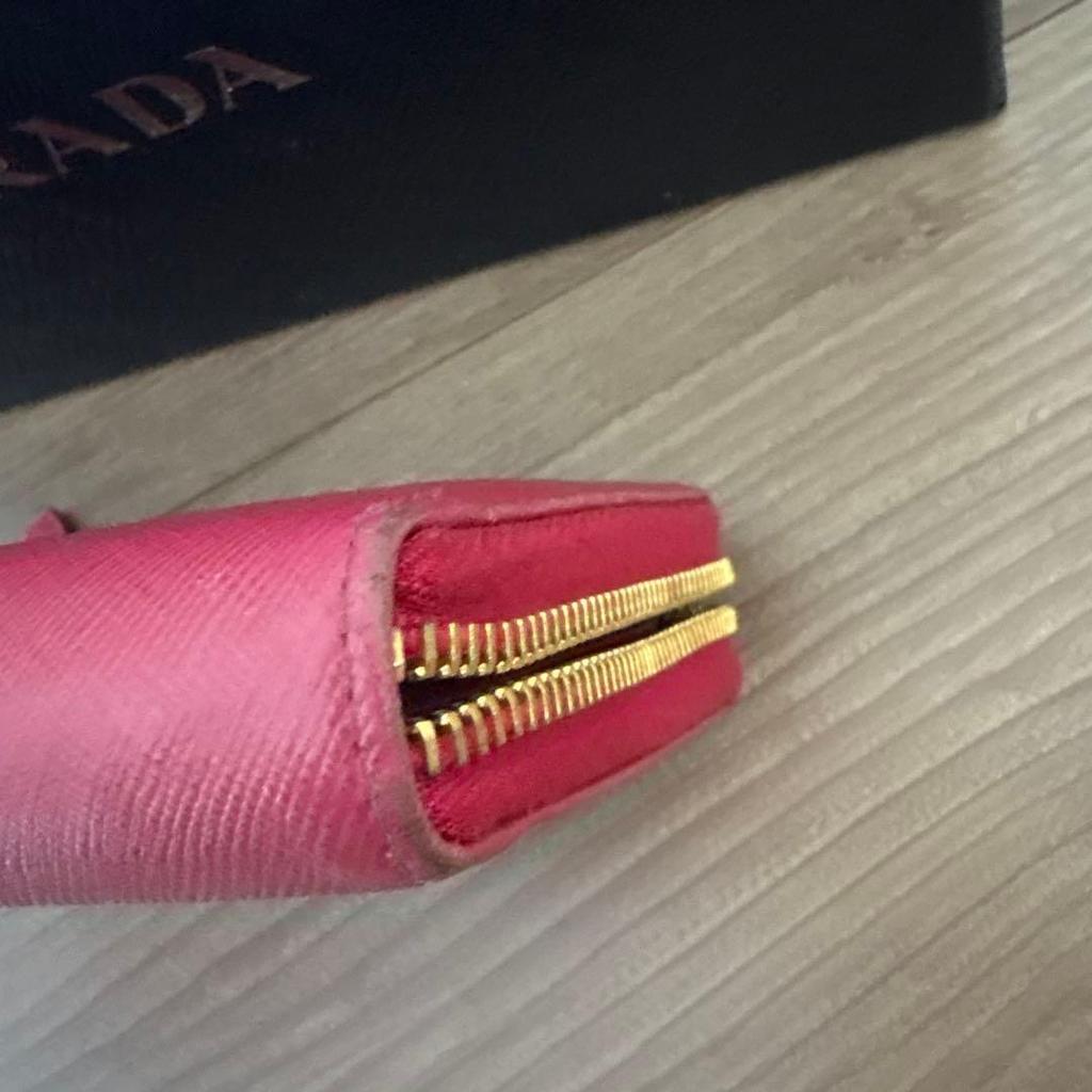 Used PRADA long wallet ribbon round zipper
