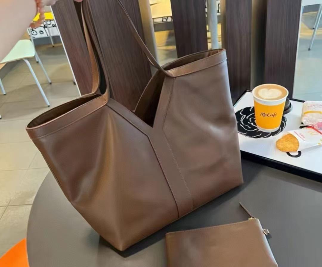 

2025 Новая Расслабляющая Кожаная Женская Сумка Универсальная Большая Вместительная Сумка Тоут Сумка Для Езды На Одно Плечо Подмышкой Сумка Трансграничная Женская Сумка 36x13x33cm