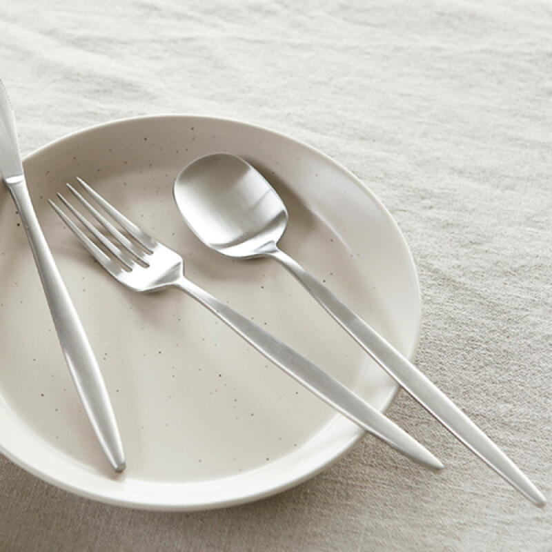 

Nouveau stainless steel spoon