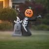 Inflatable Skeleton with Pumpkin Head Freestanding Tombstone Specters Spooky