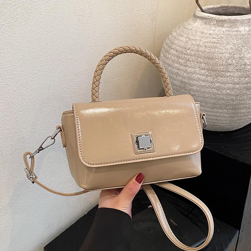 New fashion niche design popular lock clamshell bag portable shoulder messenger women's bag