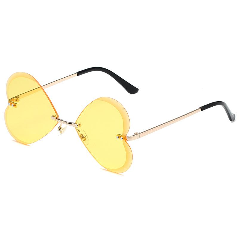 Butterfly frameless sunglasses, European and American retro trend love peach heart personalized metal sunglasses women