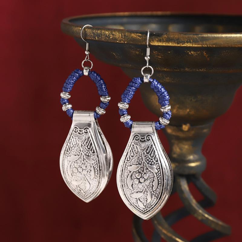 Woven earrings exaggerated Miao silver engraved earrings exotic retro style horse dress long earrings