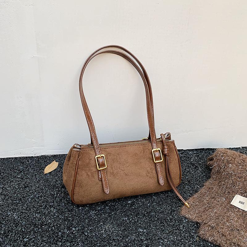 

2025 autumn new baguette armpit bag retro large capacity niche portable shoulder bowling bag lazy wind коричневый