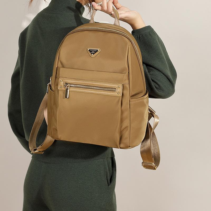 Korean Version of Daily Student Lightweight Backpack Simple New Versatile Fashion Women's Backpack Oxford Cloth Commuting Trip