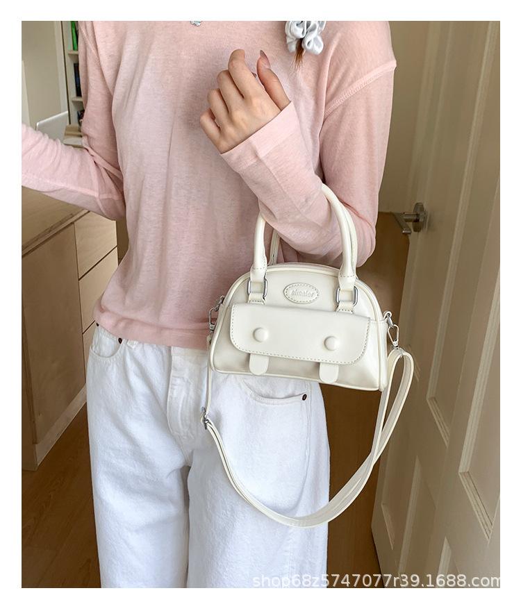 

Oil wax leather fashion hand bag women s 2025 new high-end niche shell bag commuter shoulder messenger bag білий