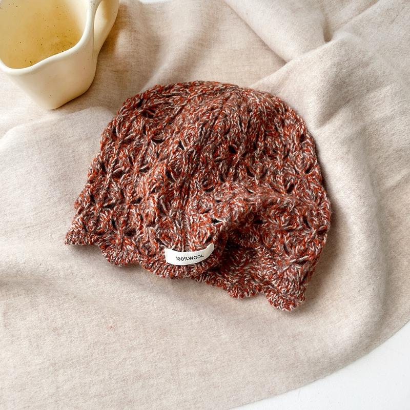 Wool knitted stacking hat women's autumn and winter new warm high-end solid color crimped ear protector wool hat