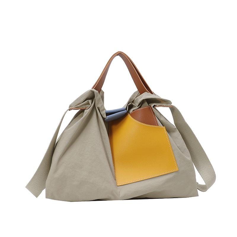 ins niche design splicing canvas bag Korean version women's shoulder bag commuter tote bag versatile casual messenger bag