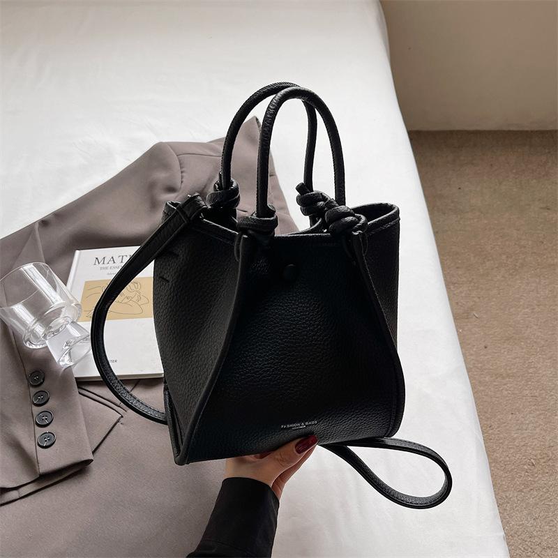 Korean Version of Niche Portable Commuter Bag Women's 2025 New Simple Bucket Bag Versatile Shoulder Cross Wing Bag