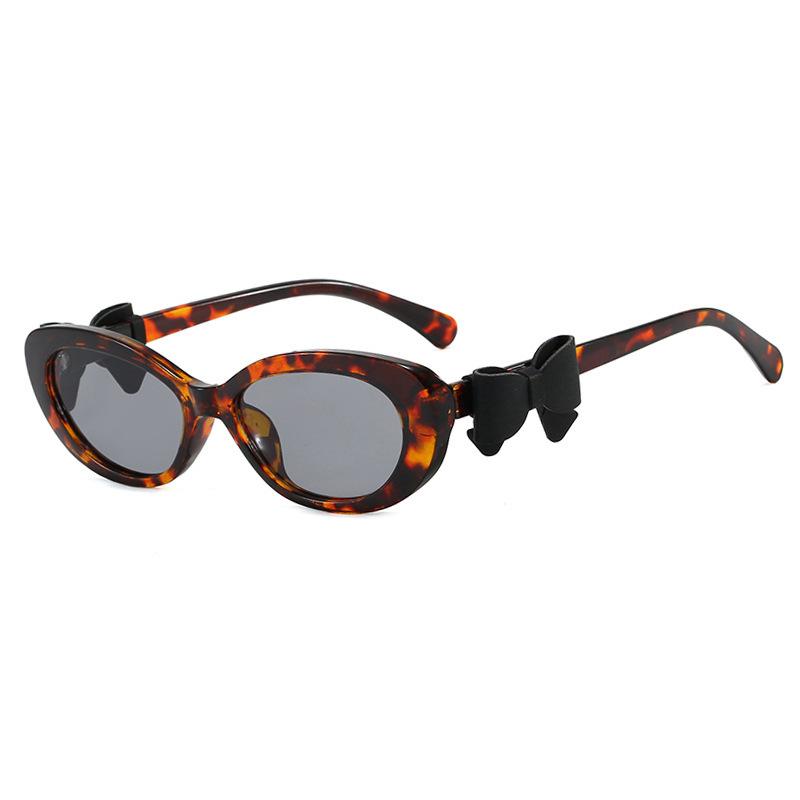 Fashion cat eye sunglasses bow decorative sunglasses women's high-end street photo UV-proof sunglasses