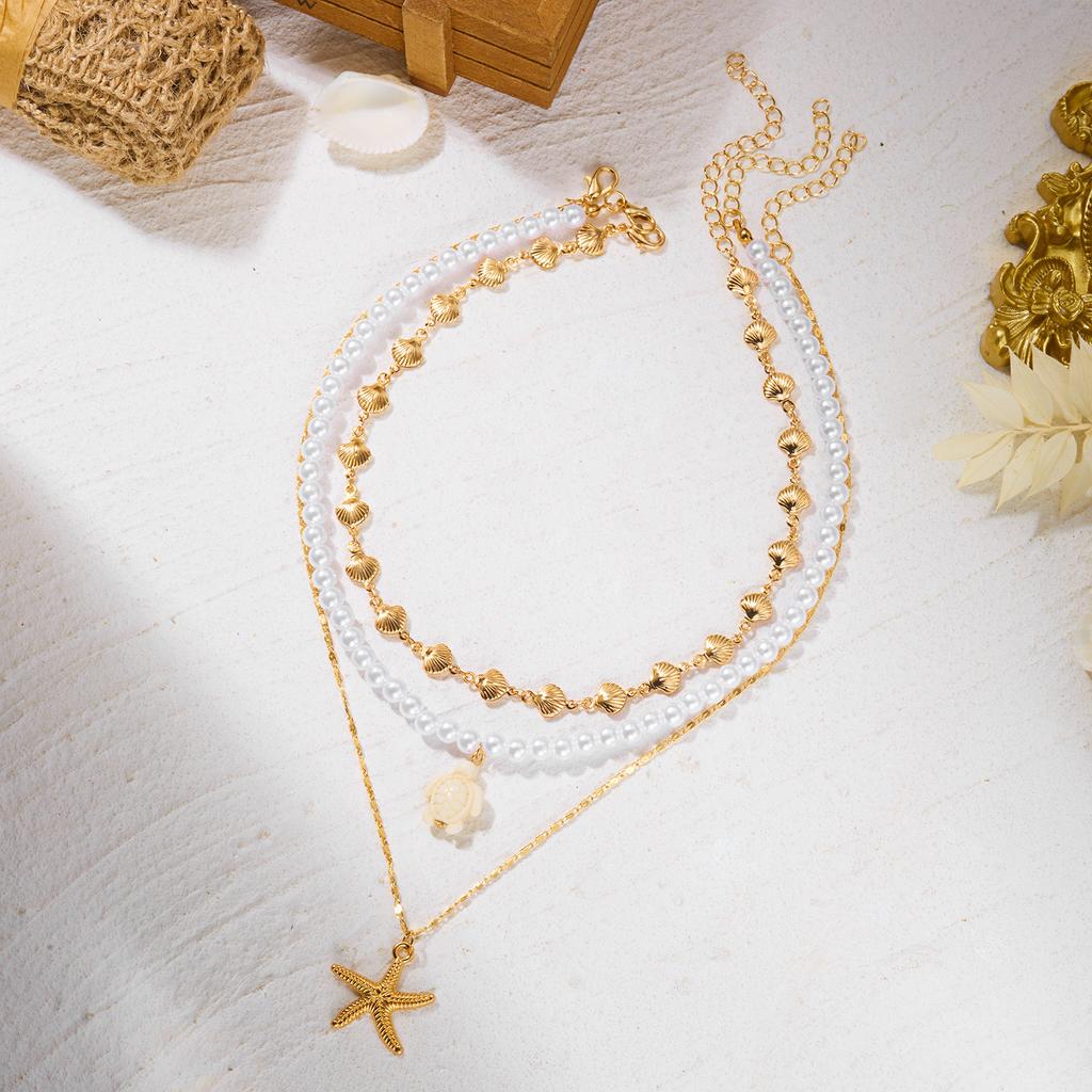 Jemný přívěsek náhrdelník s mušlí a hvězdicí z rýžových korálků pro ženy Boho Hvězdice Vrstvený klíční kost řetízek Šperky na plážovou párty Dárek