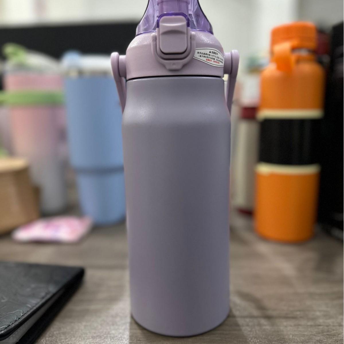 

Stainless Steel Travel Thermos Cup with Straw - Large Capacity, Portable & Stylish for Men, Women & Students 1000ML
