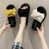 Black bow-tied one-word slippers for women's summer wear, new muffin thick-bottomed non-slip, advanced cool slippers