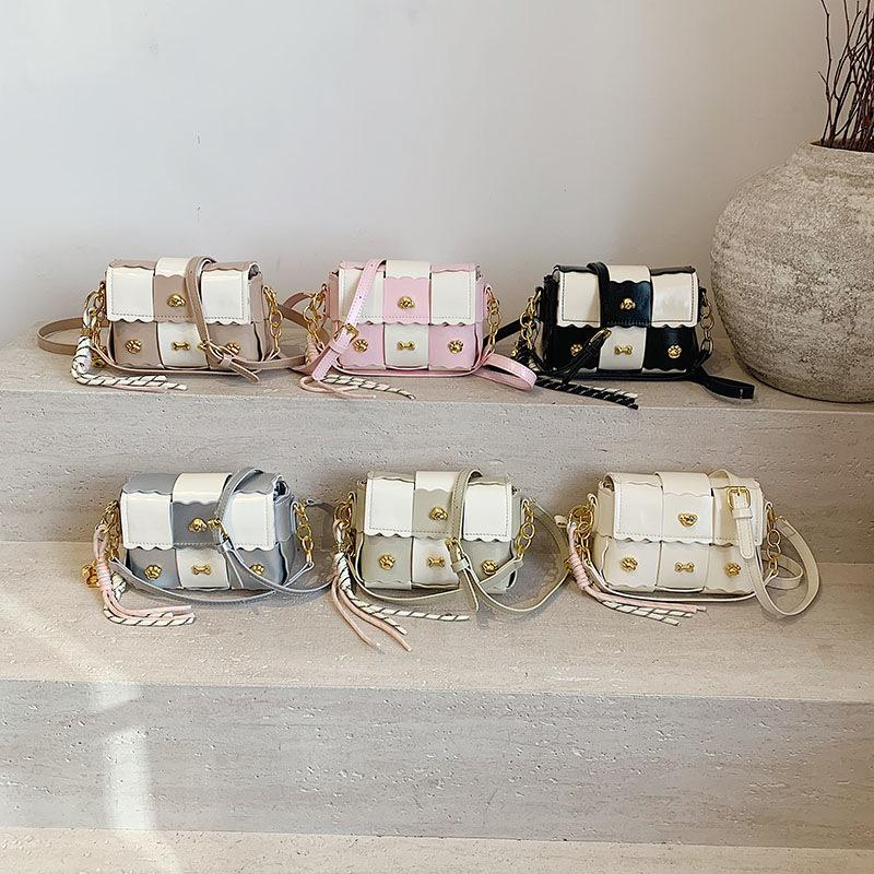 This year's popular bags 2025 spring new Korean version fashion splicing small square bag personalized rivets niche messenger bag